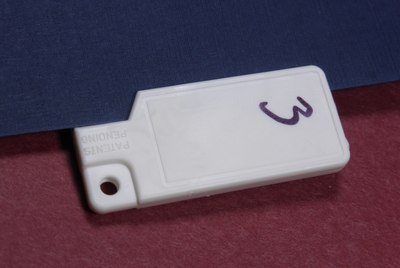 Envelopener cutting a sheet of paper